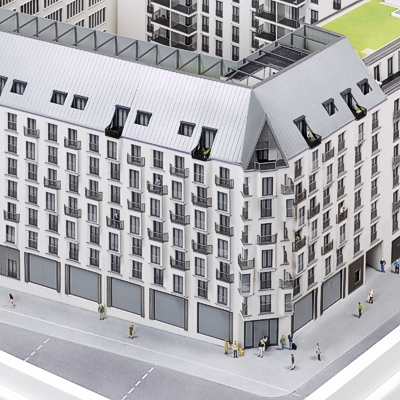 Architekturmodell einer Eckbebauung mit Hotel, Büro und Wohnungen - Blick auf Eingang